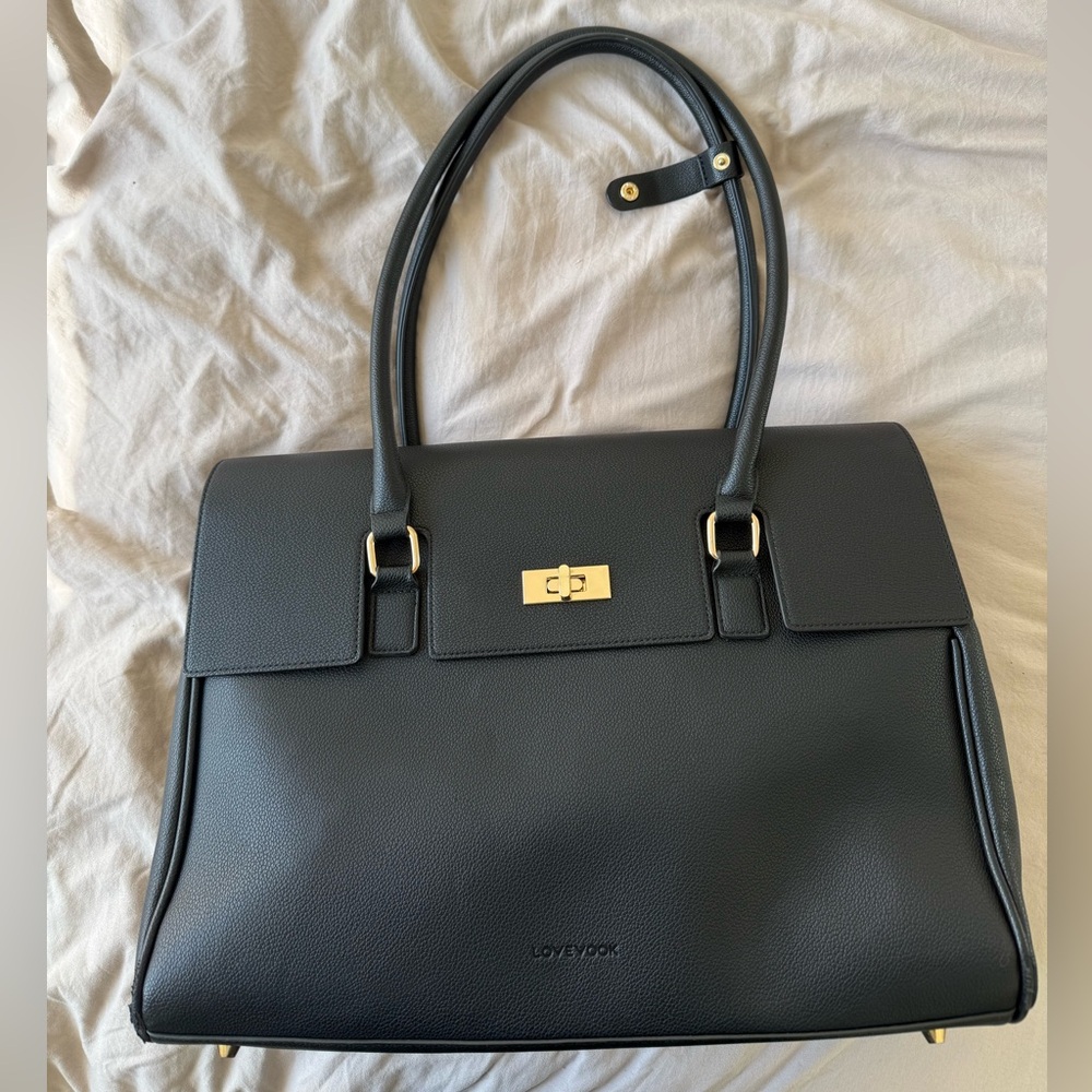 Black tote bag with laptop compartment